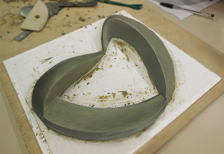 clay mold design of 3 dimensional logo